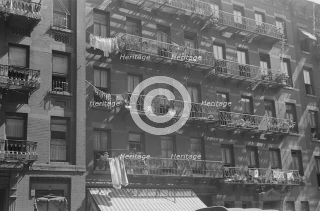 House fronts, 61st Street between 1st and 3rd Avenues, New York, 1938. Creator: Walker Evans.