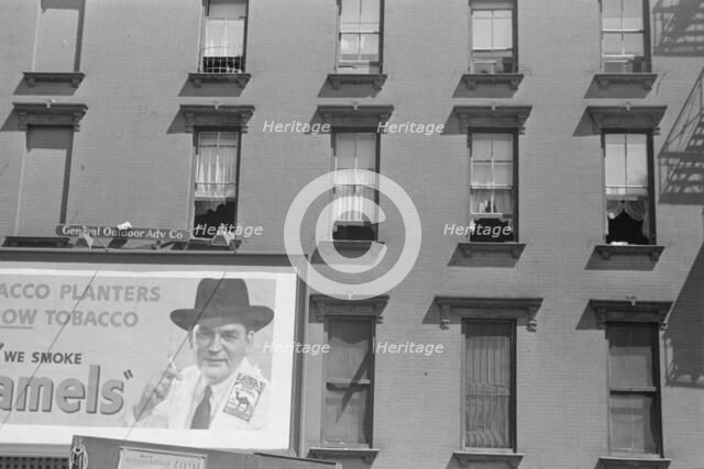House fronts, 61st Street between 1st and 3rd Avenues, New York, 1938. Creator: Walker Evans.
