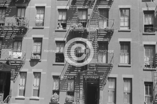 House fronts, 61st Street between 1st and 3rd Avenues, New York, 1938. Creator: Walker Evans.