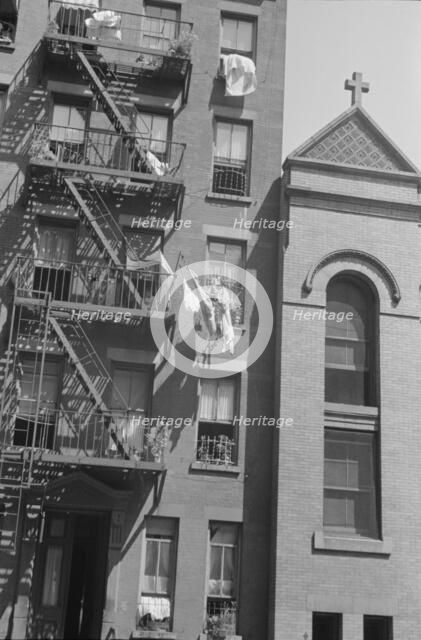 House fronts, 61st Street between 1st and 3rd Avenues, New York, 1938. Creator: Walker Evans.