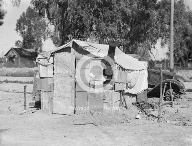 House in camp of carrot pullers, near Holtville, Imperial Valley, California, 1939. Creator: Dorothea Lange.