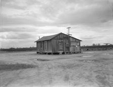 House in "Little Oklahoma", California, 1936. Creator: Dorothea Lange