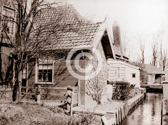 House on a canal bank, Broek, Netherlands, 1898.Artist: James Batkin