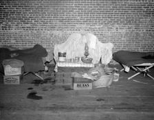 Household goods of a Negro flood refugee in the temporary infirmary, Forrest City, Arkansas, 1937. Creator: Walker Evans