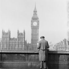 Houses of Parliament seen from the Albert Embankment with a man reading..., London, 1964. Creator: John Gay