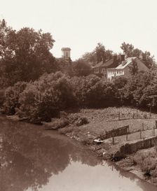 Houses on Water Street, from the bridge, Fredericksburg, Virginia, between 1927 and 1929. Creator: Frances Benjamin Johnston
