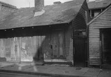 Houses in the French Quarter, New Orleans, between 1920 and 1926. Creator: Arnold Genthe