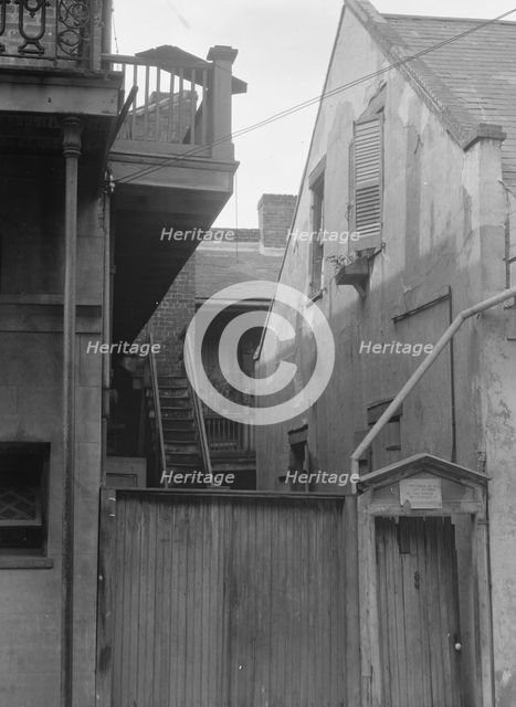 Houses in the French Quarter, New Orleans, between 1920 and 1926. Creator: Arnold Genthe.
