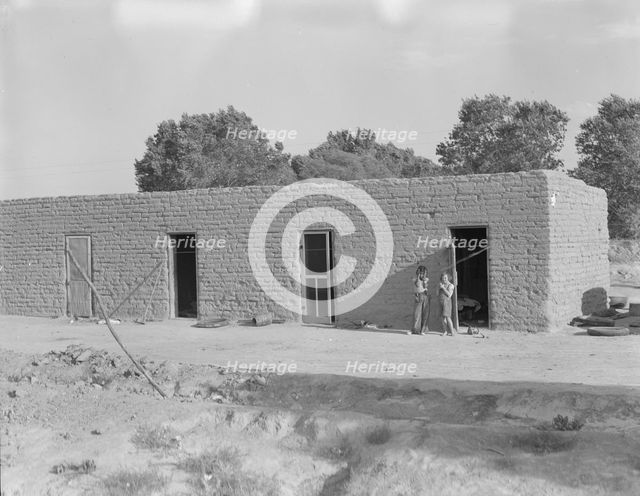 Housing for Mexican field laborers, near Chandler, Arizona, 1937. Creator: Dorothea Lange.