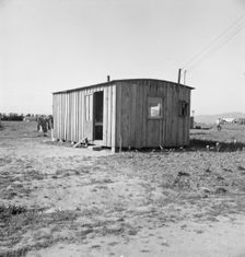 Housing for rapidly growing settlement of lettuce workers on fringe of town, Salinas, CA , 1939. Creator: Dorothea Lange