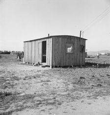 Housing for rapidly growing settlement of lettuce workers on fringe of town, Salinas, CA , 1939. Creator: Dorothea Lange