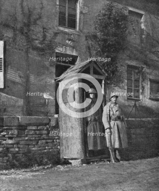 Hours of Victory; American sentry and French sentry at the entrance to a village..., 1917. Creator: Unknown.