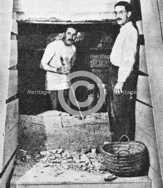 Howard Carter at the entrance to Tutankhamun's tomb, Luxor, Egypt, 1922-1923. Artist: Unknown