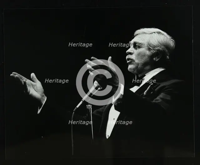 Howard Keel in full song at the Forum Theatre, Hatfield, Hertfordshire, 14 May 1983. Creator: Denis Williams.