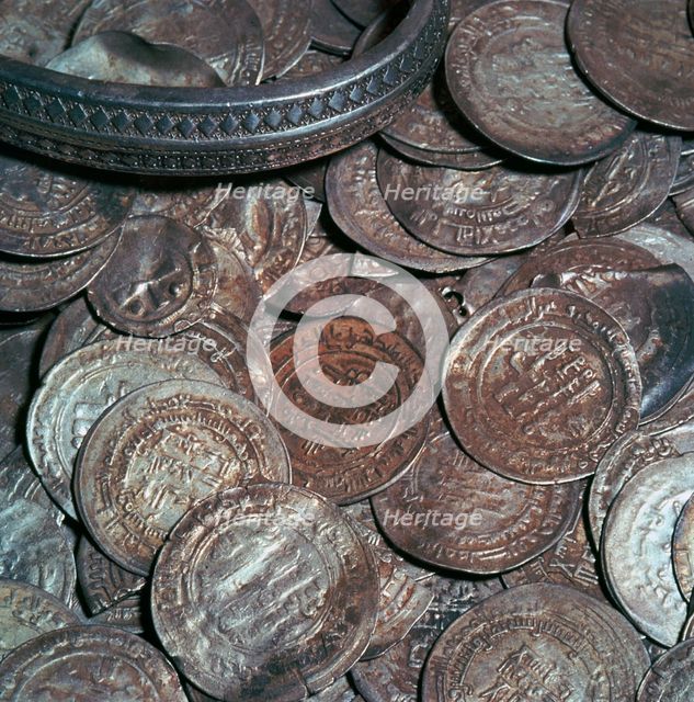 Hoard of silver with arab coins from a Viking grave. Artist: Unknown