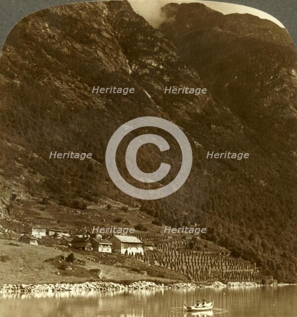 'Hogrending farm, nestling at the mountain's base, on the E. shore of Lake Loen, Norway', c1905. Creator: Unknown.