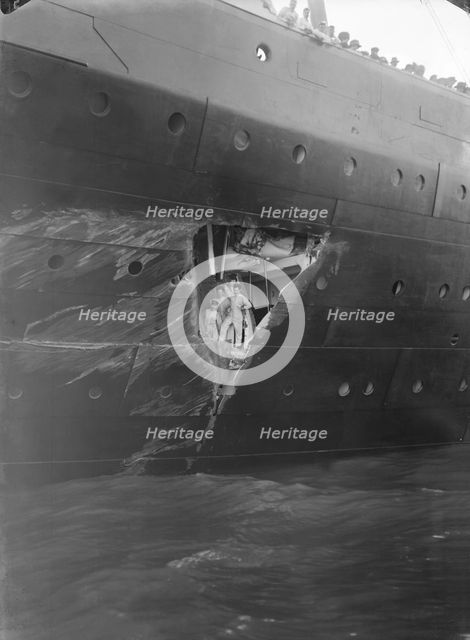 Hole torn in the hull of 'RMS Olympic' after the collision with 'HMS Hawke' in the Solent, 1911. Creator: Kirk & Sons of Cowes.