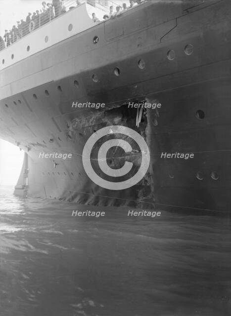 Hole torn in the hull of 'RMS Olympic' after the collision with 'HMS Hawke' in the Solent, 1911. Creator: Kirk & Sons of Cowes.