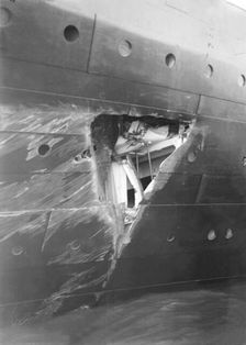 Hole torn in the hull of RMS Olympic after the collision with HMS Hawke in the Solent, 1911. Creator: Kirk & Sons of Cowes