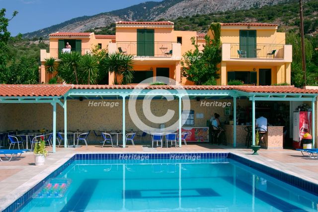 Holiday apartments and swimming pool, Lourdas, Kefalonia, Greece. Creator: Peter Thompson.