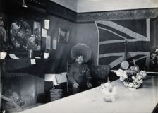 Holmleigh Auxiliary Military Hospital, Harrow: a soldier with amnesia sitting in a room..., c1922. Creator: Unknown