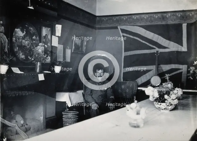 Holmleigh Auxiliary Military Hospital, Harrow: a soldier with amnesia sitting in a room..., c1922. Creator: Unknown.