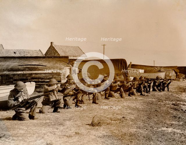 Holy Island fishermen Home Guards rifle practice, Lindisfarne, Northumberland, World War II, 1942. Creator: Unknown.