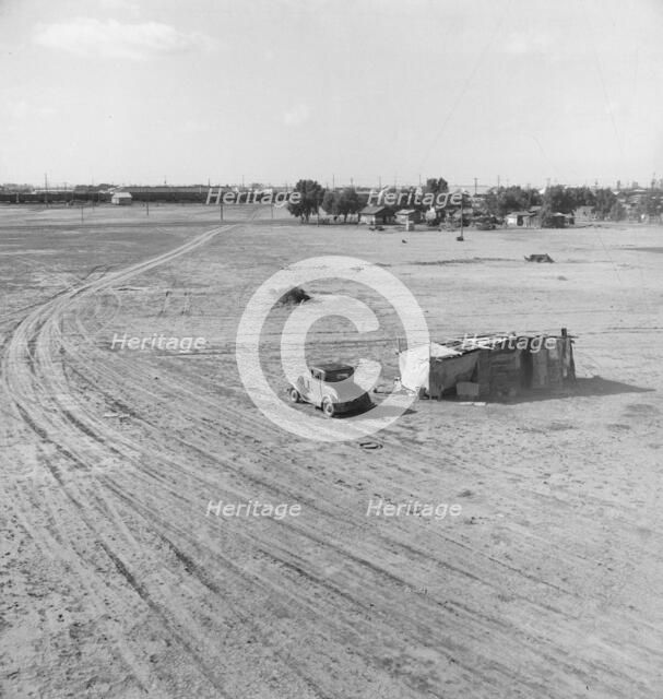 Home of Mexican family migratory workers, Calipatria, Imperial Valley, California, 1939. Creator: Dorothea Lange.