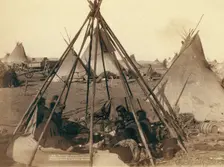 Home of Mrs American Horse Visiting squaws at Mrs A's home in hostile camp, 1891. Creator: John C. H. Grabill