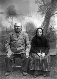 Homeowner and church steward Näs Jonas Jonsson (1825-1908) with his wife..., 1900-1908. Creator: Per Persson