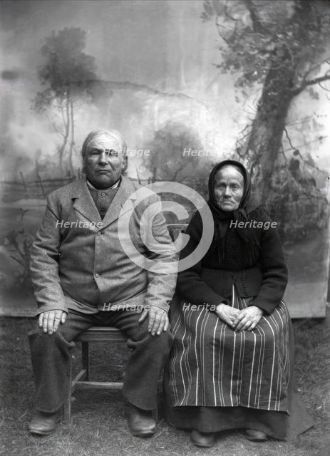 Homeowner and church steward Näs Jonas Jonsson (1825-1908) with his wife..., 1900-1908. Creator: Per Persson.
