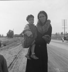 Homeless mother and youngest child of seven...on U.S. 99, near Brawley, Imperial County, 1939. Creator: Dorothea Lange