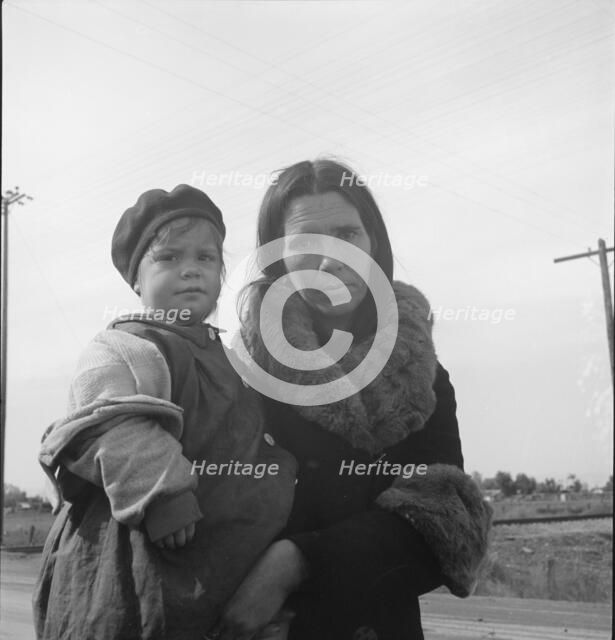 Homeless mother and youngest child of seven...US99, near Brawley, Imperial County, 1939. Creator: Dorothea Lange.