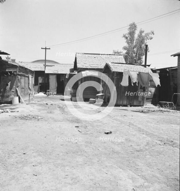Homes of Mexican field workers, Brawley, Imperial Valley, California, 1935. Creator: Dorothea Lange.
