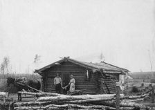 Homesteaders and their home, between c1900 and c1930. Creator: Unknown