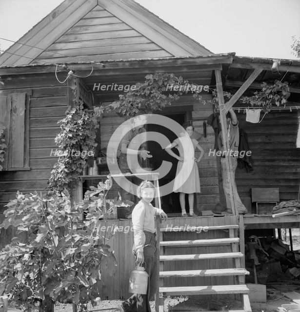 Hop farmer's children, small owner, and backyard..., near Independence, Polk County, Oregon, 1939. Creator: Dorothea Lange.