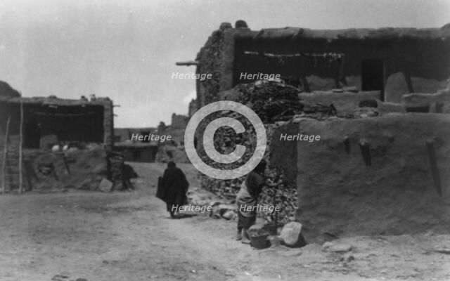 Hopi house builder, c1905. Creator: Edward Sheriff Curtis.