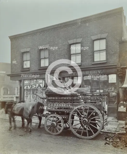 Horse and cart with sacks of vegetables, Bow, London, 1900. Artist: Unknown.