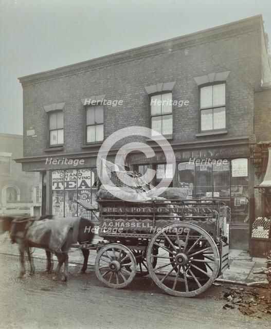 Horse and cart with sacks of vegetables, Bow, London, 1900. Artist: Unknown.