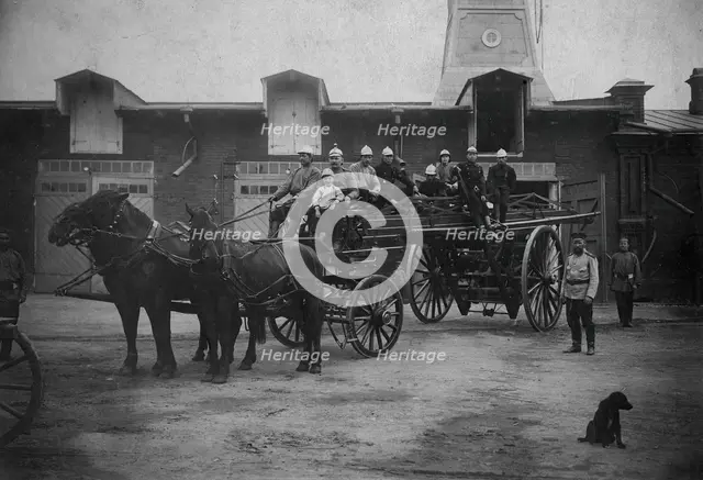 Horse-Drawn Departure of a Fire Ladder, early 20th century. Creator: Unknown.