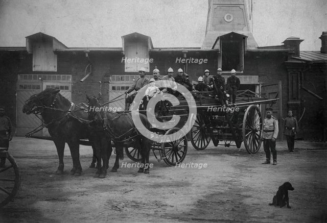 Horse-Drawn Departure of a Fire Ladder, early 20th century. Creator: Unknown.