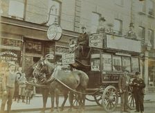 Horse-drawn omnibus and passengers, London, 1900