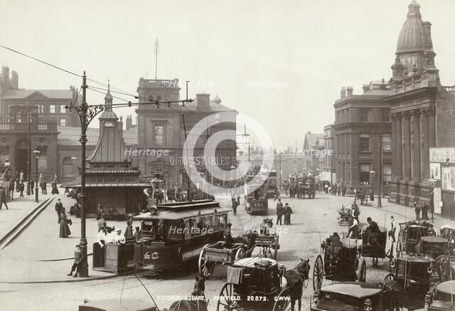 Horse-drawn taxis and electric trams on Fitzalan Square, Sheffield, Yorkshire, c1900 Creator: GW Wilson and Company.
