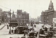 Horse-drawn taxis and electric trams on Fitzalan Square, Sheffield, Yorkshire, c1900 Creator: GW Wilson and Company