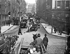 Horse-drawn vehicles in Queen Street, London, 1870-1900. Artist: York