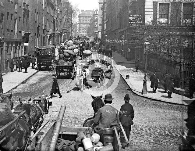 Horse-drawn vehicles in Queen Street, London, 1870-1900. Artist: York