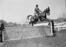 Horse Shows - Col. A.W. Dunn, Hurdling, 1911. Creator: Harris & Ewing