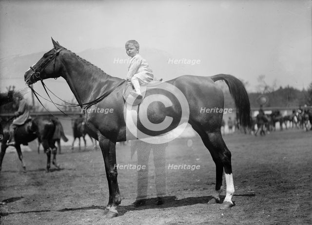 Horse Shows - Baby Vincent Mclean On 'Indian Flower', 1912. Creator: Harris & Ewing.