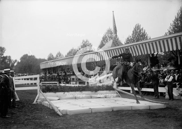 Horse Shows. Broad Jump, 1914. Creator: Harris & Ewing.