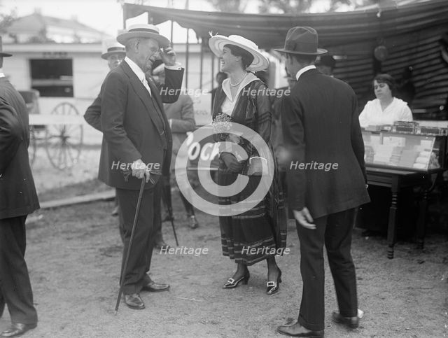 Horse Shows - Judge Moore And Mrs. Hitt, 1916. Creator: Harris & Ewing.
